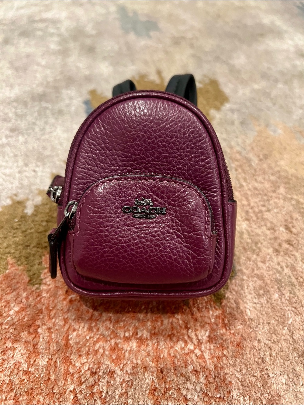 COACH Pebbled Leather Mini Backpack Charm in Plum
